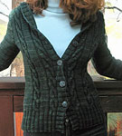 handknit hooded cabled cardigan; Malabrigo Worsted Merino Yarn color VAA #51