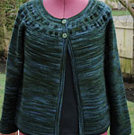 handknit cabled cardigan; Malabrigo Worsted Merino Yarn color VAA #51