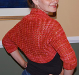 knit shrug; Malbrigo Worsted Merino, color 194 cinnabar