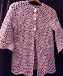 Raglan Cardigan Liesl; Malabrigo Worsted Merino Yarn, color orchid 34