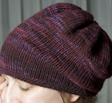 Malabrigo Worsted Yarn, color 204 velvet grapes, slouchy hat