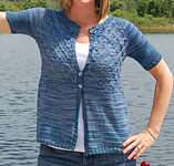 Hand knitted cardigan knit with Malabrigo Sock yarn color azules