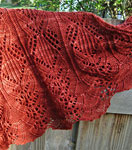 Hand-knit lacey scarf/shawl with Malabrigo Merino Sock Yarn color botticelli red