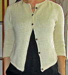 Hand-knit cardigan sweater with Malabrigo Merino Sock Yarn color natural