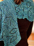 Hand-knit lace scarf/shawl knit with Malabrigo Merino Sock Yarn color solis